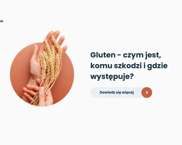 Dłonie trzymające kłosy zboża na tle okręgu.
